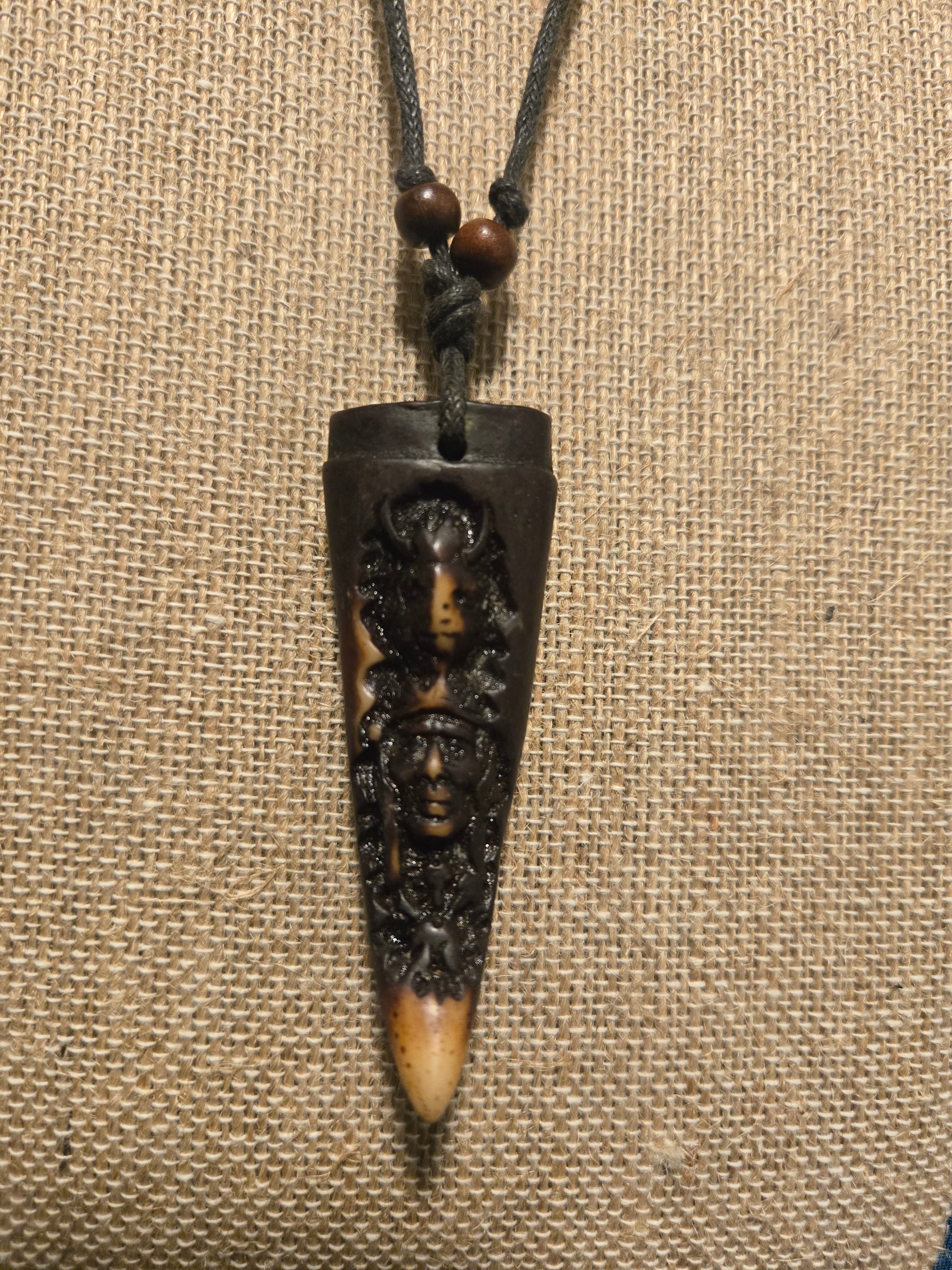 Carved tribal style necklace