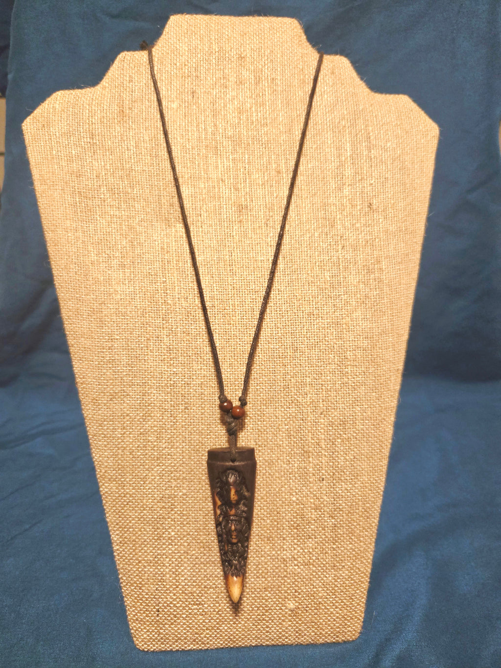 Carved tribal style necklace