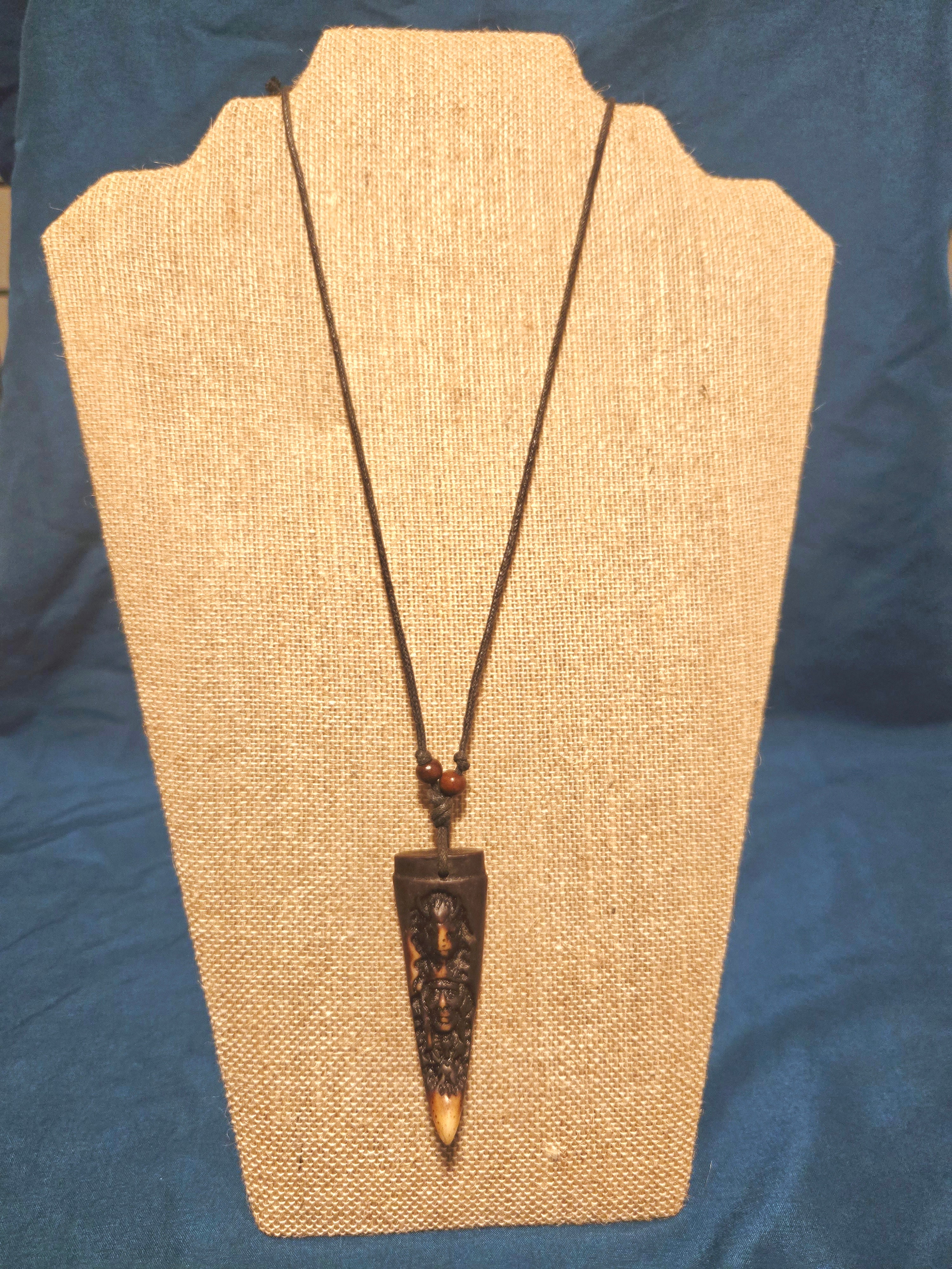 Carved tribal style necklace
